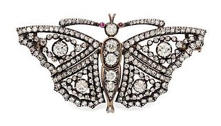 A Victorian Silver Topped Gold, Diamond and Ruby Butterfly Brooch, 15.20 dwts.