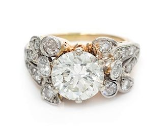 A Platinum Topped Gold and Diamond Ring, 4.60 dwts.