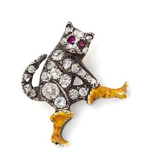 A Victorian Silver, Diamond and Enamel 'Puss in Boots' Diamond Stickpin Topper, 0.70 dwts.