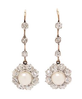 A Pair of Edwardian Platinum Topped Gold, Pearl and Diamond Dangle Earrings, 3.80 dwts.