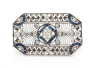 An Edwardian Silver Topped Gold, Diamond and Sapphire Brooch, 7.90 dwts.