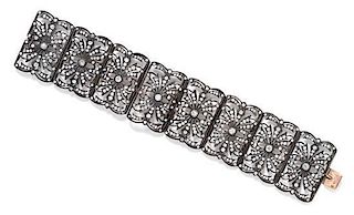 A Silver Topped Gold and Diamond Bracelet, 46.60 dwts.