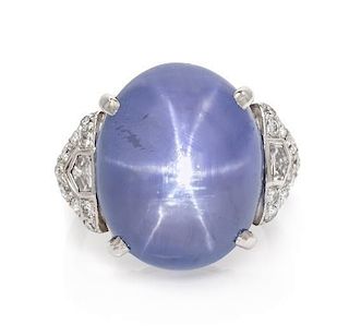 A Platinum, Star Sapphire and Diamond Ring, 8.10 dwts.