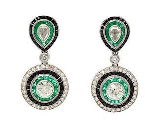 A Pair of Platinum, Diamond, Emerald and Onyx Pendant Earrings, 8.40 dwts.