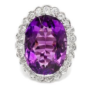 An Art Deco White Gold, Amethyst and Diamond Ring, 8.80 dwts.