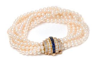 * An 18 Karat Yellow Gold, Diamond and Sapphire Multistrand Cultured Pearl Torsade Bracelet, Oscar Heyman & Brothers,