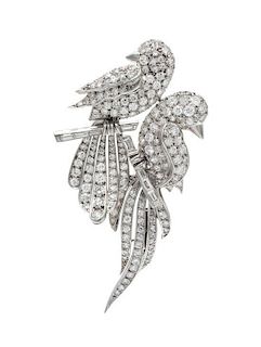 A Platinum and Diamond Love Bird Brooch, 13.10 dwts.