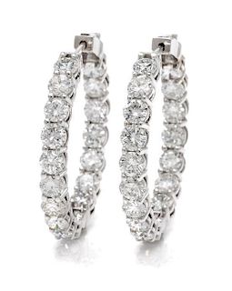 A Pair of 18 Karat White Gold and Diamond Inside-Out Hoop Earrings, 11.00 dwts.