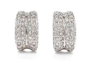 A Pair of 18 Karat White Gold and Diamond Earclips, 9.20 dwts.