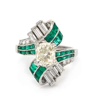 An Art Deco Platinum, Diamond and Emerald Ring, 5.90 dwts.