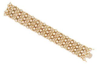 An 18 Karat Yellow Gold and Diamond Multistrand Bracelet, Crivelli, 41.20 dwts.