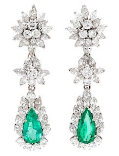 A Pair of Platinum, Emerald and Diamond Pendant Earrings, 15.60 dwts.