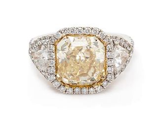 A Platinum, Yellow Gold, Fancy Light Yellow Diamond, and Diamond Ring, 5.30 dwts.