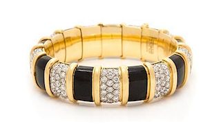 An 18 Karat Yellow Gold, Platinum, Diamond and Onyx 'Paillone' Bangle Bracelet, Jean Schlumberger for Tiffany & Co., 98.20 dw