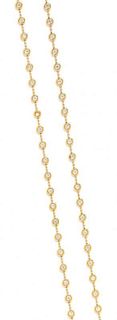 An 18 Karat Yellow Gold and Diamond Station Longchain Necklace, Crivelli, 34.10 dwts.