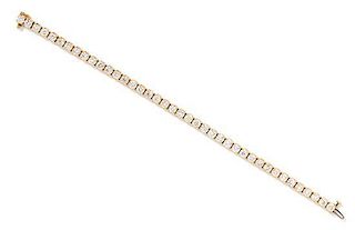 A 14 Karat Yellow Gold and Diamond Line Bracelet, 11.20 dwts.