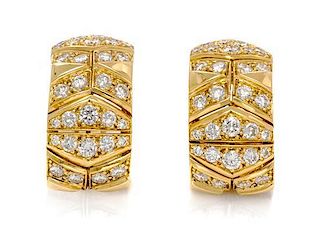 A Pair of 18 Karat Yellow Gold and Diamond Earclips, Cartier, Paris, 13.20 dwts.