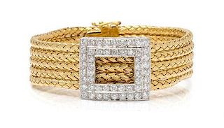 An 18 Karat Bicolor Gold and Diamond Bracelet, 22.80 dwts.