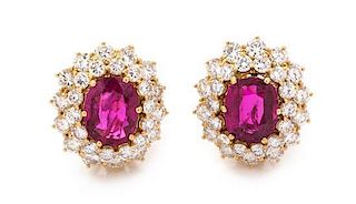 A Pair of 18 Karat Yellow Gold, Ruby and Diamond Earclips, 6.60 dwts.