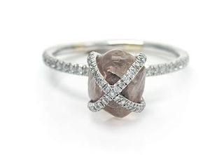 An 18 Karat White Gold, Rough Diamond and Diamond 'Embrace' Ring, Diamond in the Rough, 2.30 dwts.