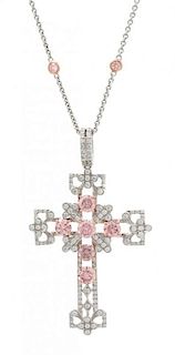 An 18 Karat Bicolor Gold, Colored Diamond and Diamond Cross Pendant and Chain, 9.80 dwts.
