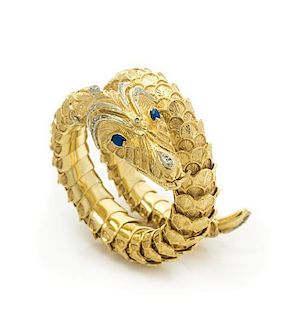 A Bicolor Gold, Diamond and Sapphire Serpent Wrap Bracelet, 99.40 dwts.