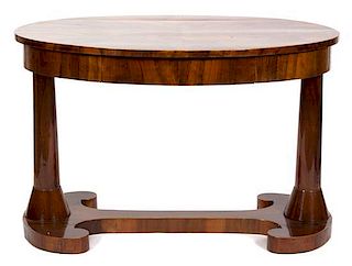 A Biedermeier Table in the Style of Josef Danhauser Height 30 x width 47 x depth 31 inches.
