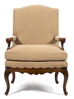 A Louis XV Style Walnut Fauteuil Height 42 inches.