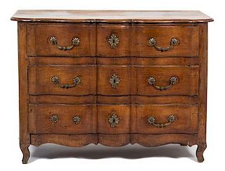 A Louis XV Provincial Style Carved Walnut Three Drawer Commode Height 36 x width 49 x depth 23 1/2 inches.
