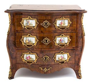 A Louis XV Style Porcelain and Gilt Metal Mounted Miniature Bombe Chest of Drawers