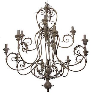 A Twelve-Light Louis XV Style Patinated Metal Chandelier Height 36 x diameter 45 inches.