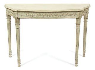 A Louis XVI Style Carved and Painted Console Table Height 31 1/4 x 47 1/2 x depth 20 inches.