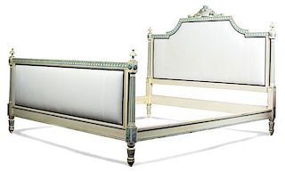 A Louis XVI Style Painted and Upholstered Bed Height 52 x width 80 inches.