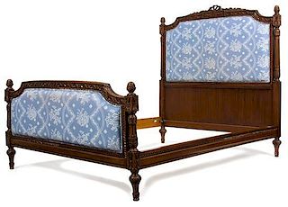 A Louis XVI Style Carved Mahogany Upholstered Headboard and Footboard