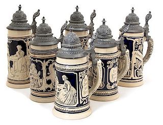 A Collection of Six German Pottery Steins Height 8 1/2 x diameter 3 3/4 inches.