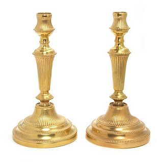 A Pair of Gilt Bronze Candlesticks Height 10 3/4 inches.