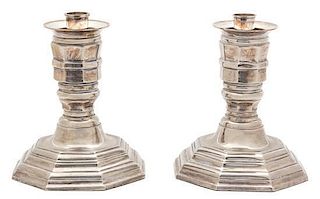 A Pair of Etched Glass and Weighted Silverplate Hurricane Lamps Height 17 1/2 inches.