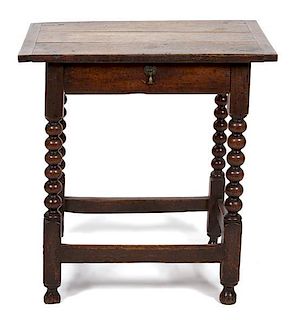 A Jacobean Style Carved Oak Side Table Height 27 x width 22 x depth 18 inches.