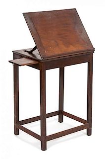 A Georgian Style Mahogany Book Stand Height when closed 29 x width 20 x depth 15 inches.
