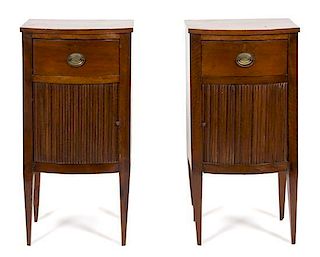 A Pair of Regency Mahogany Bow Front Side Cabinets Height 34 x width 17 x depth 15 inches.