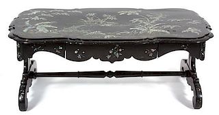 A Victorian Black Lacquered and Mother-of-Pearl Inset Low Table Height 20 x width 50 x depth 28 inches.