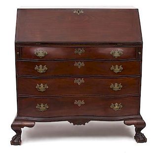 An American Chippendale Style Mahogany Slant Front Oxbow Desk Height 45 x width 46 x depth 25 inches.