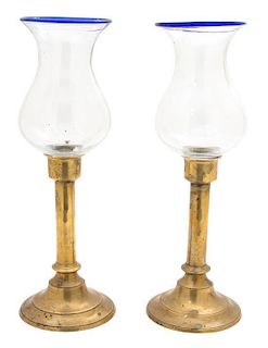 A Pair of American Brass Candlesticks with Blown Glass Hurricane Shades