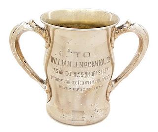 An American Silver Trophy Cup, George W. Sheibler & Co., New York, NY, 1897, with double handles; monogrammed