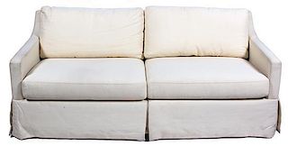 A Contemporary White Upholstered Sofa Height 32 x width 77 x 36 inches.
