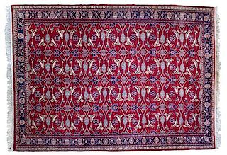 A Persian Wool Rug 8 feet 8 inches x 6 feet 3 inches.