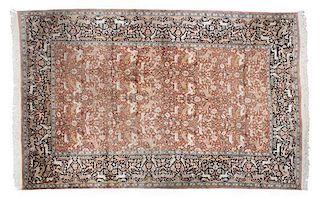 A Persian Wool Rug 9 feet 9 inches x 6 feet 8 1/2 inches.