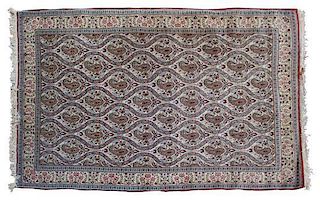 A Tabriz Wool Rug 7 feet x 4 feet 5 inches.