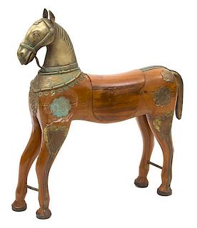 A Brass Mounted Carved Wood Model of a Horse Height 26 inches.