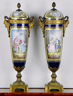 Pair of ormolu mounted and covered porcelain vases by Sevres